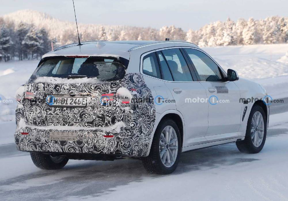 صور تجسسية بي ام دبليو iX3 الجديد صورة 2 من الجانب