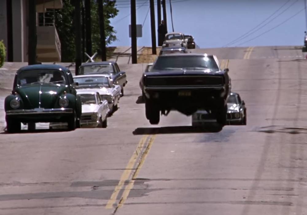 قصة صورة ستيف ماكوين وسيارة موستانج الخضراء من فيلم بولت صورة 3